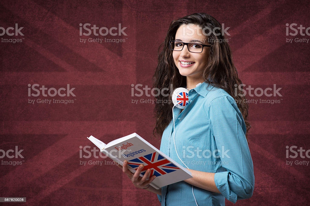 beautiful-student-girl-posing-with-notebooks-picture-id587820028