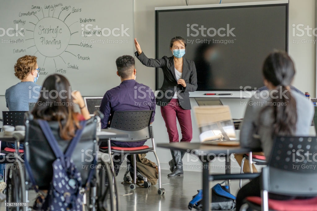masked-university-students-in-class-picture-id1282751575